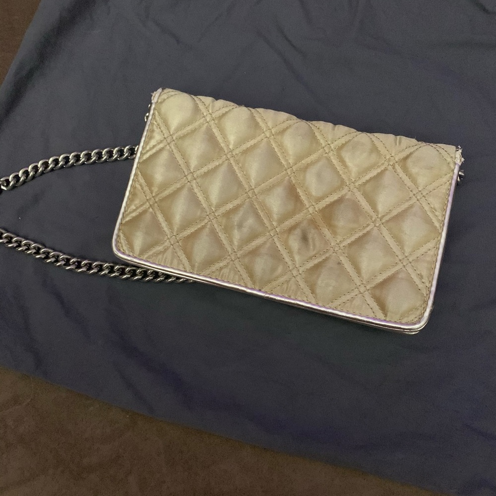 Marc Jacobs gold wallet on chain